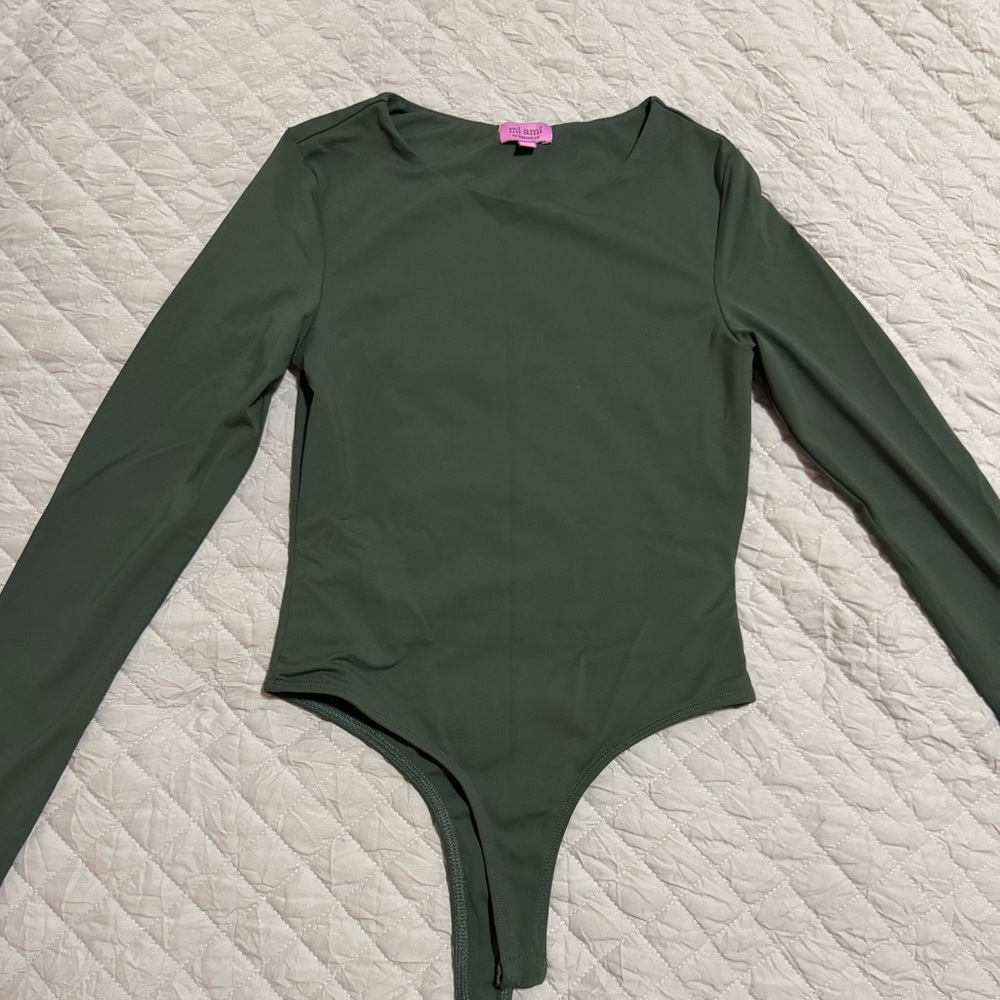Women’s green bodysuit